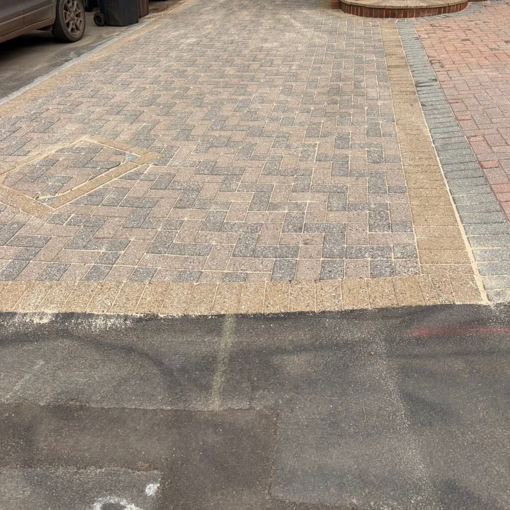 Herringbone block paving driveway after cleaning by Owens Exterior Cleaning, Devon