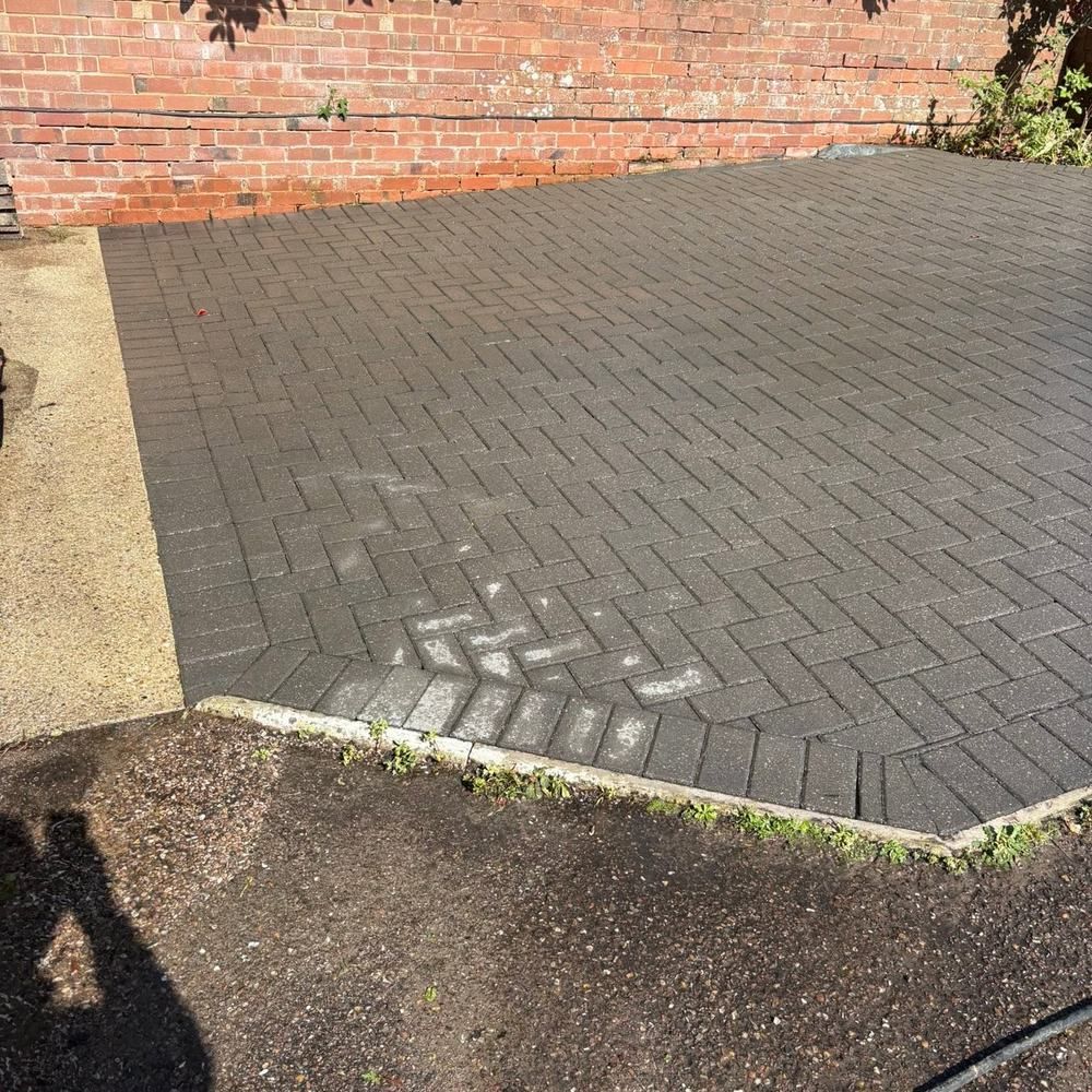 Charcoal block paving driveway after cleaning by Owens Exterior Cleaning, Devon