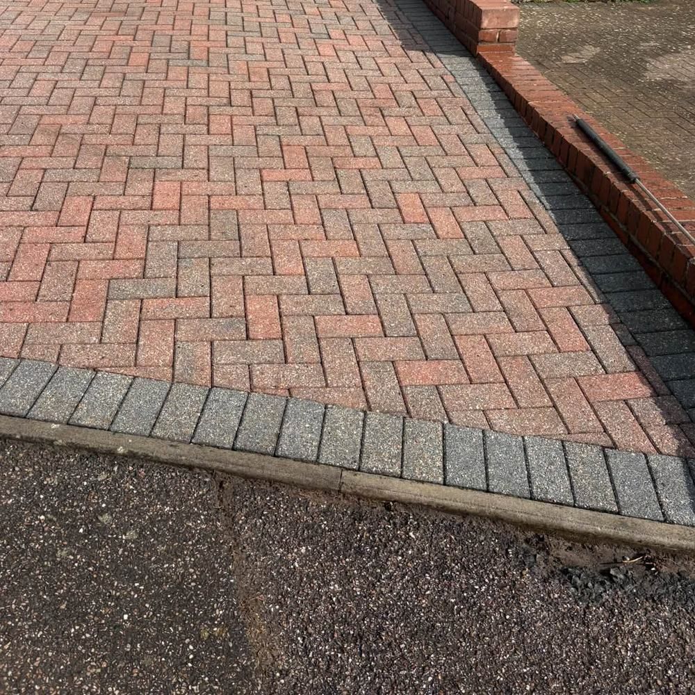 Red block paving driveway after cleaning by Owens Exterior Cleaning, Devon (view 1)