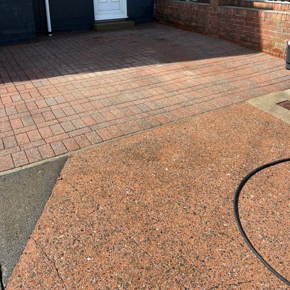 Red block paving front driveway after cleaning by Owens Exterior Cleaning, Devon
