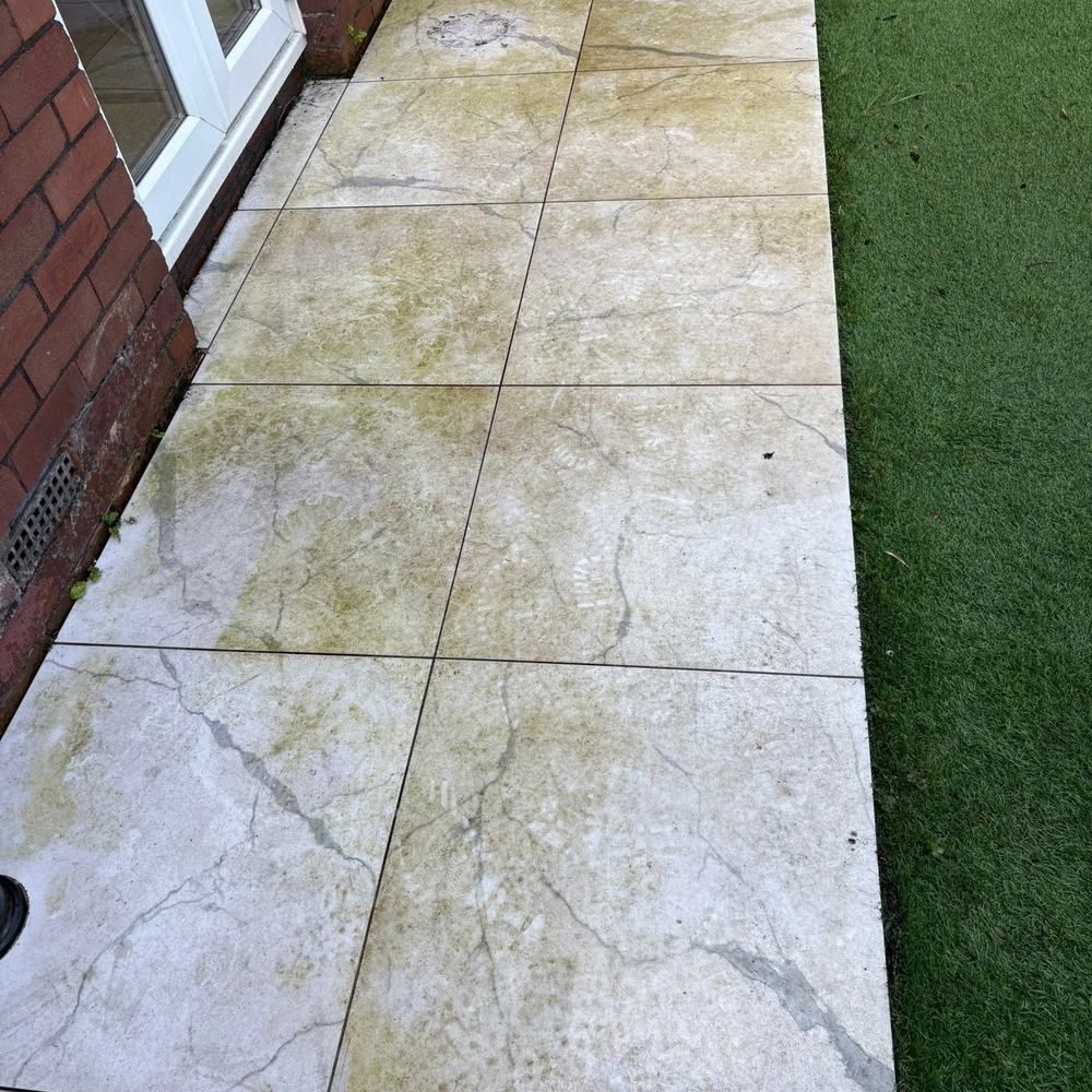 Porcelain patio path before cleaning by Owens Exterior Cleaning, Devon