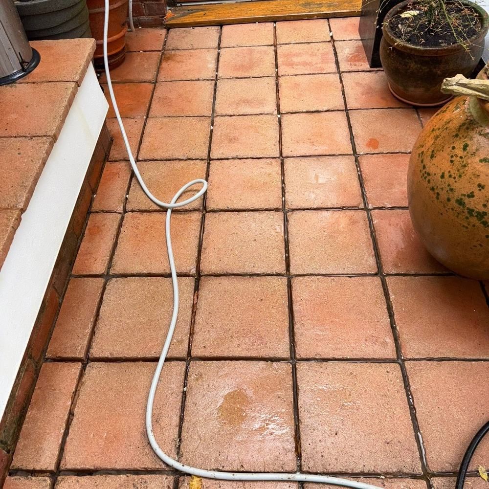 Quarry tile patio after cleaning by Owens Exterior Cleaning, Devon