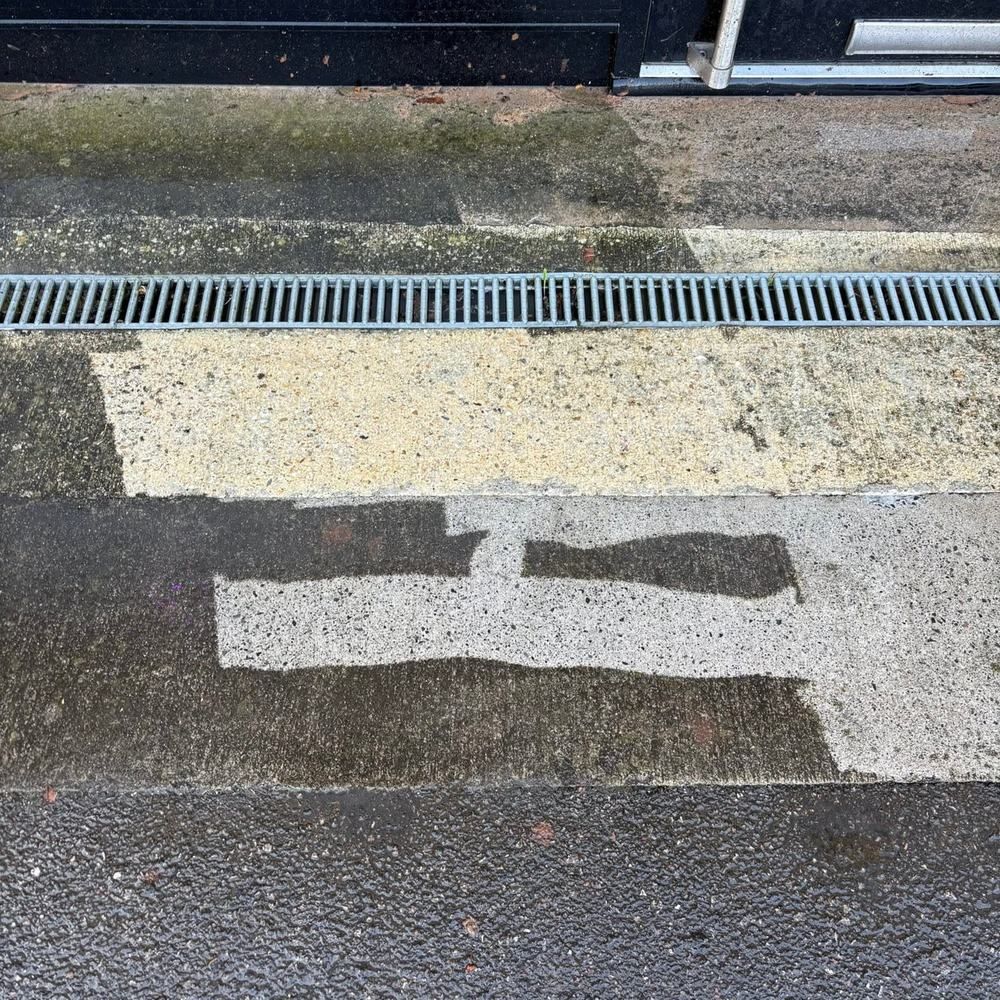 Concrete path before and after cleaning by Owens Exterior Cleaning, Devon