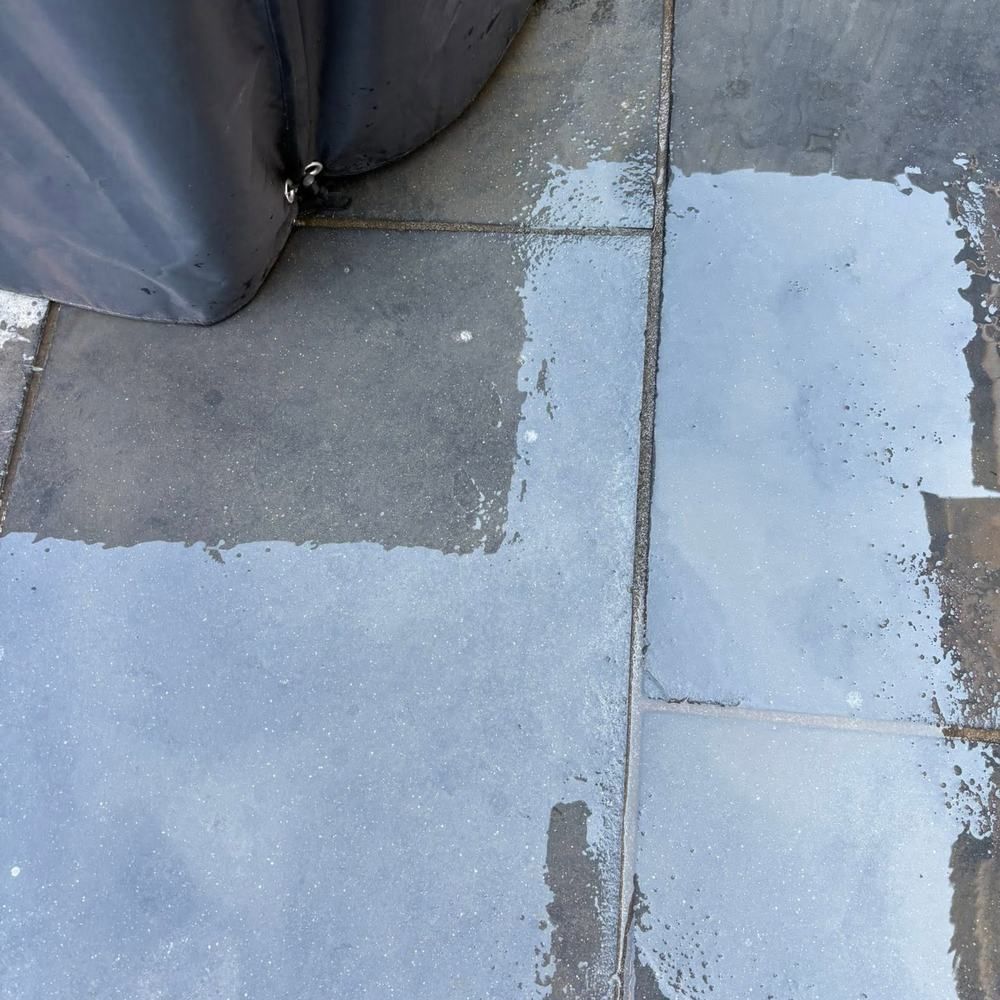 Grey paving slabs before and after cleaning by Owens Exterior Cleaning, Devon