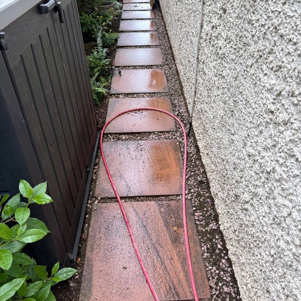Tiled garden path before cleaning by Owens Exterior Cleaning, Devon